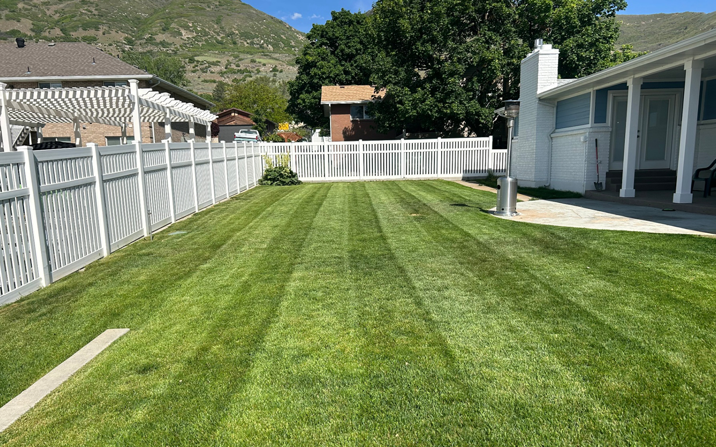 Freshly mowed lawn with clean stripes in Davis County, Utah